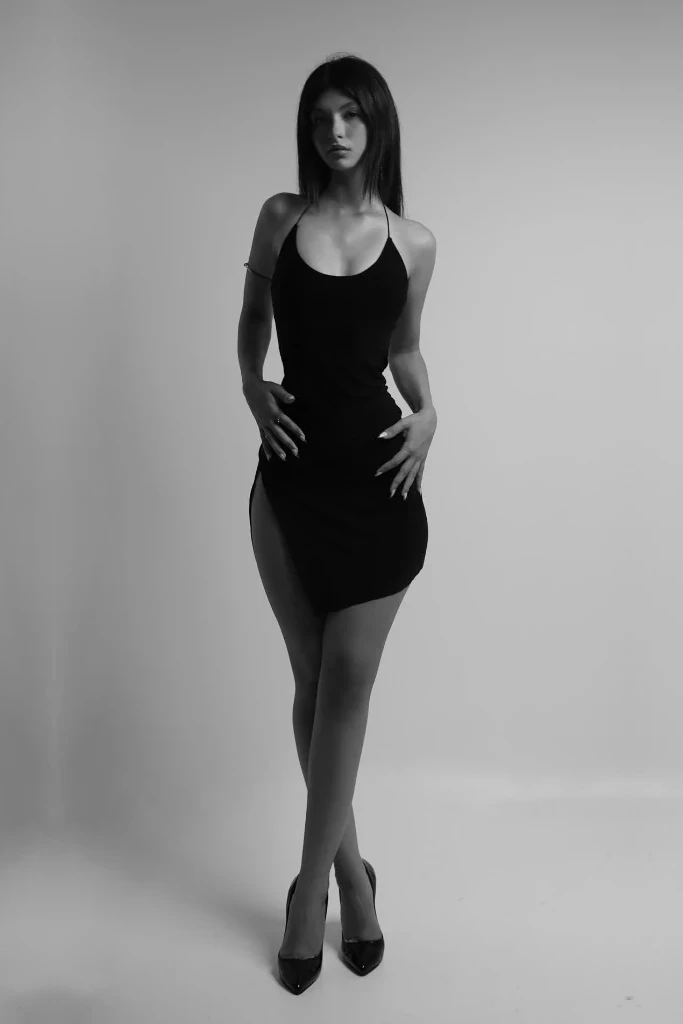 Birsen Çelik in a monochrome black dress studio portrait